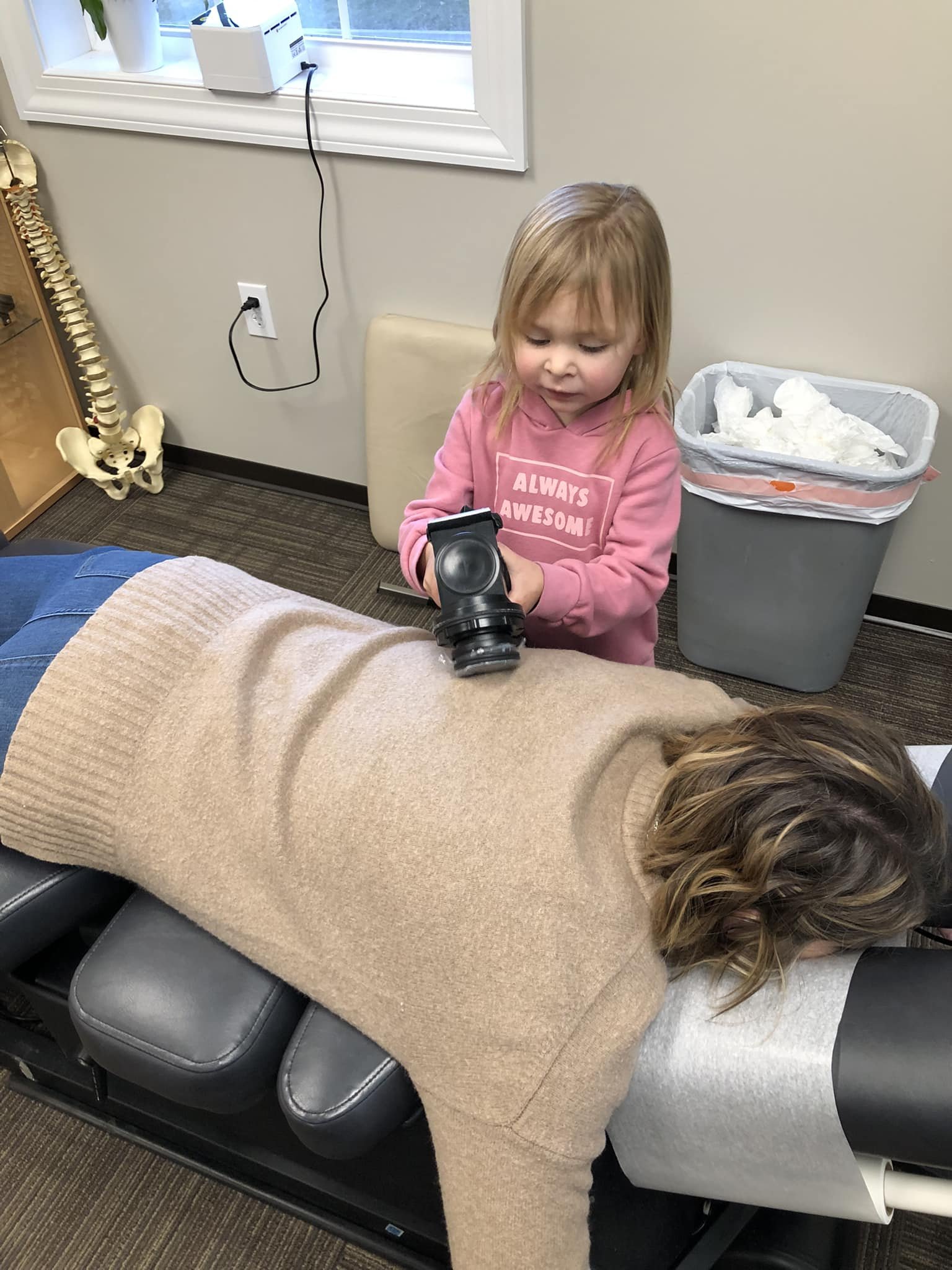 Family moment in the chiropractic office